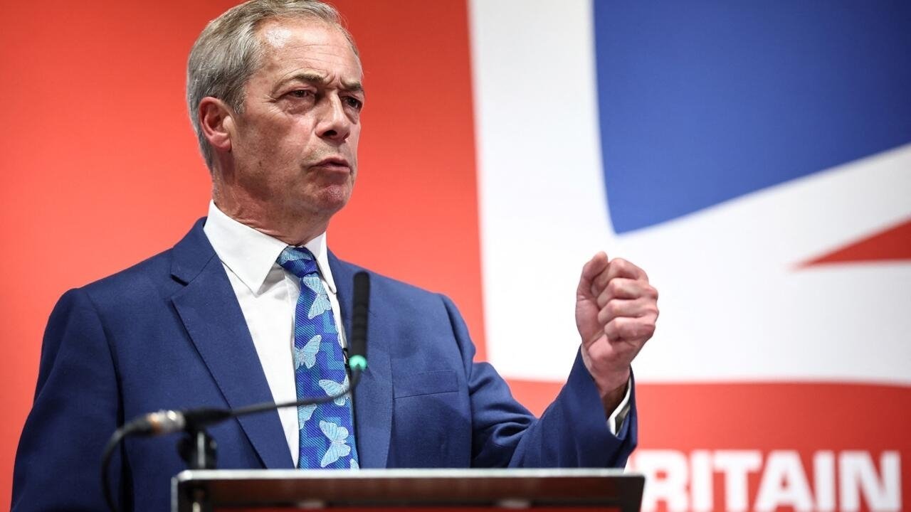 Honorary president of British right-wing populist party Reform UK Nigel Farage speaks during a campaign meeting, June 3, 2024. © Henry Nicholls, AFP